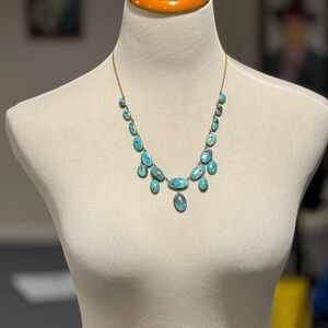 Turquoise and gold necklace. 12k gold filled chain. Some of the stones show wear
